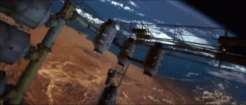 Earth From Space With Foreground Buildings GIF