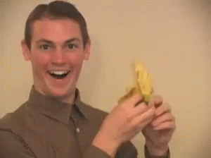 Creepy Smiling Man Eating Banana GIF
