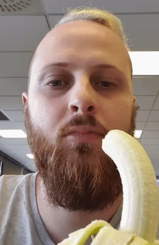 Bearded Man Eating Banana GIF