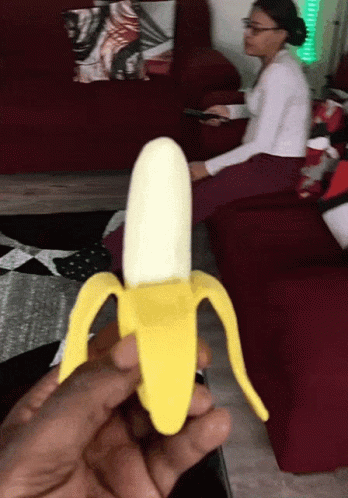 Eating Banana Prank On Woman GIF