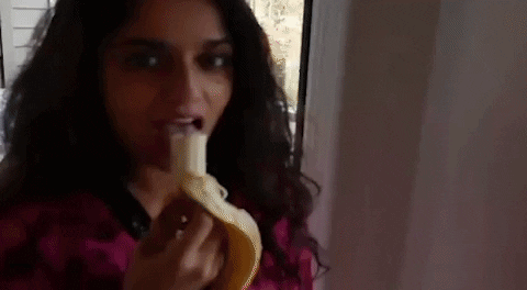 Indian Woman Eating Banana GIF