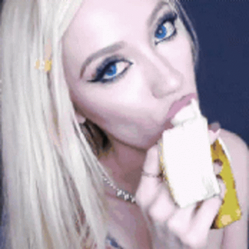 Pretty Woman Eating Banana GIF