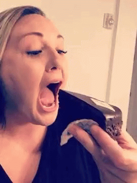 Woman Eating A Slice Of Cake GIF