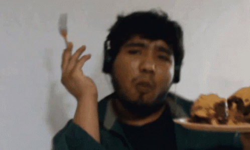 Dancing Guy Eating Cake GIF