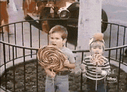 Eating Candy At Theme Park GIF