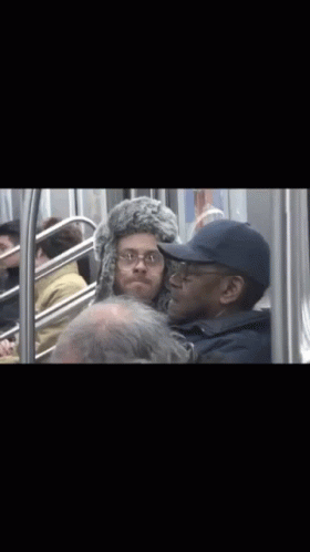 Ed Bassmaster Riding Train Making Neutral Face GIF