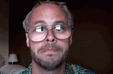 Ed Bassmaster Staring At Screen With Mouth Murmuring GIF