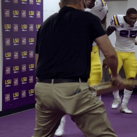 Ed Orgeron Smashing Steel Chair GIF