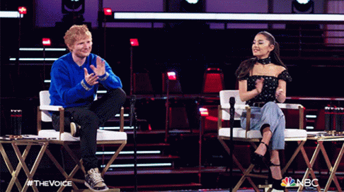 Ed Sheeran And Ariana Grande Are Sitting In Front Of Microphones On The Voice GIF