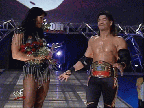 Eddie Guerrero Chyna Cheek Kiss GIF