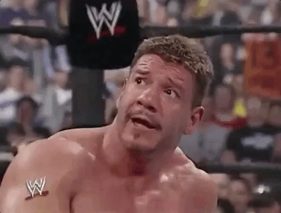 Eddie Guerrero Shocked Falls On Canvas GIF