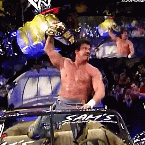 Eddie Guerrero Showing Off Championship Belt GIF