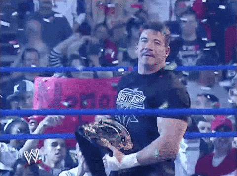 Eddie Guerrero Wearing Belt Raining Confetti GIF
