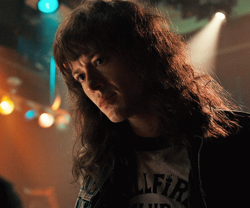 Eddie Munson Serious To Unserious GIF