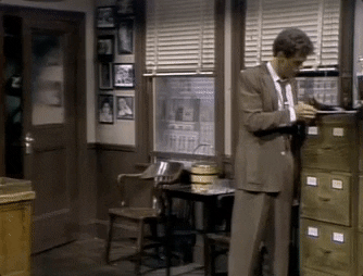Eddie Murphy Entering Office In Gumby Suit GIF