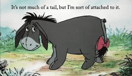 Eeyore from Winnie the Pooh with Red Bow on Tail