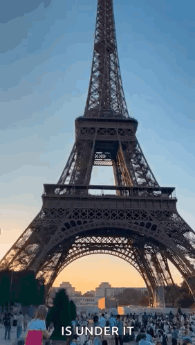 Eiffel Tower Under Construction with Crowd