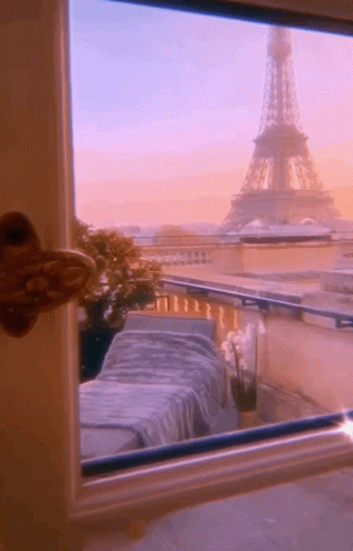 Eiffel Tower Visible Through Window