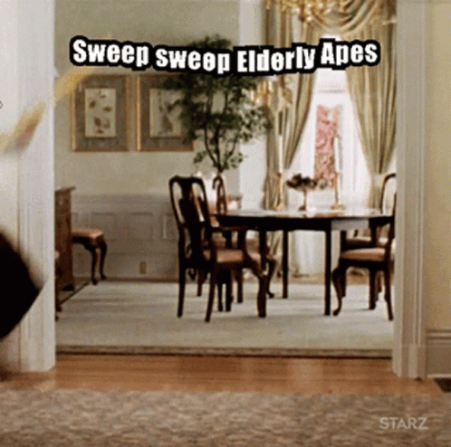 Elderly Apes Sweeping in Dining Room