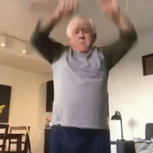 Elderly Man Dancing In Living Room GIF