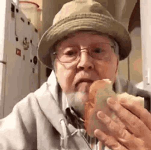 Elderly Man Eating Idiot Sandwich GIF