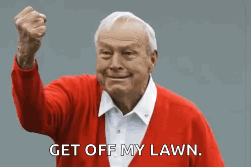 Elderly Man in Red Sweater Saying Get Off My Lawn