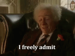 Elderly Man in Suit Saying I Freely Admit