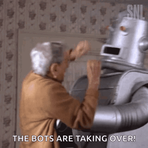 Elderly Man Next To Robot Saying Bots Are Taking Over