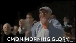 Elderly Man Shouting in Crowd