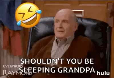 Elderly Man Sitting In Chair Laughing Emoji GIF