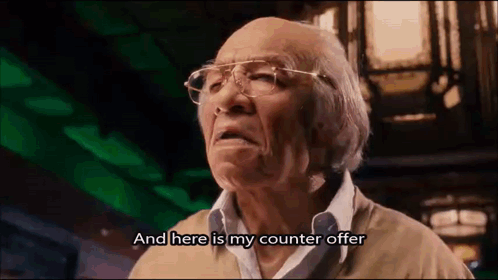 Elderly Man with Glasses Saying Counter Offer