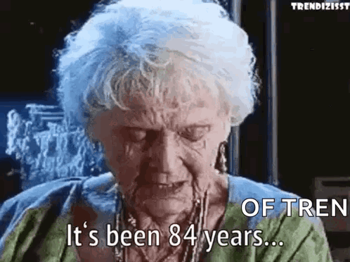 Elderly Woman Crying Says It's Been 84 Years Of Tren GIF
