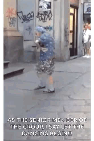 Elderly Woman Dancing On Sidewalk Let The Dancing Begin GIF