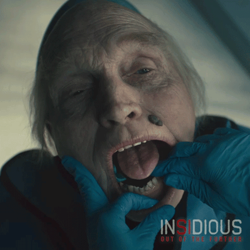 Elderly Woman Getting Teeth Examined In Insidious GIF