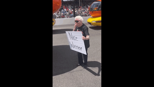 Elderly Woman Holding Nice Wiener Sign GIF