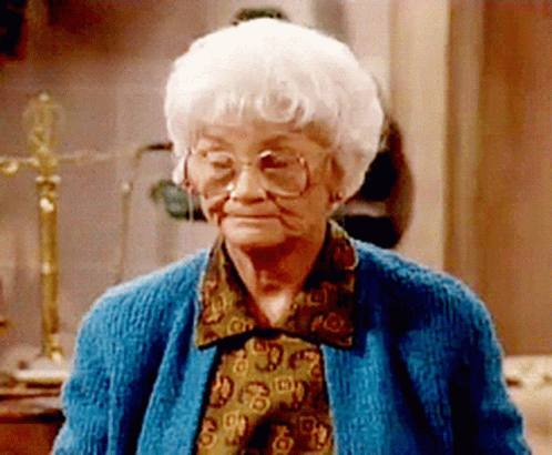Elderly Woman in Blue Sweater