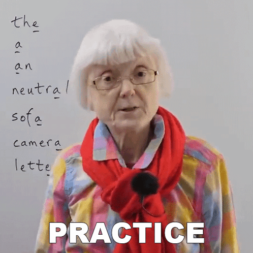 Elderly Woman in Glasses and Red Scarf at Practice Whiteboard
