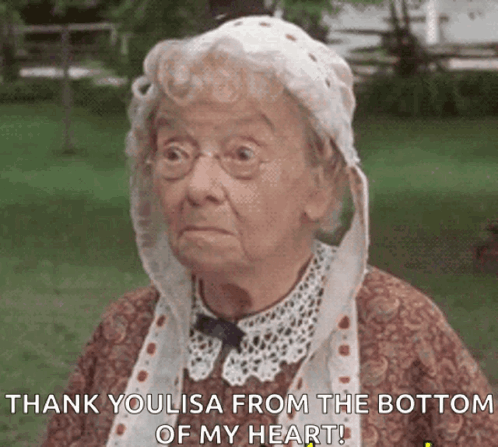 Elderly Woman in Glasses and White Hat Says Thank You Lisa From the Bottom of My Heart
