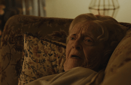 Elderly Woman Sitting on Couch Says I'm 84 Years Old Tom