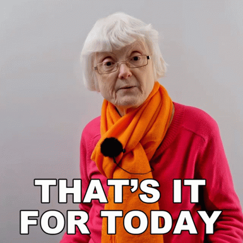 Elderly Woman Wearing Glasses And Orange Scarf GIF
