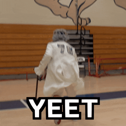 Elderly Woman With Cane Running Basketball Court Yeet