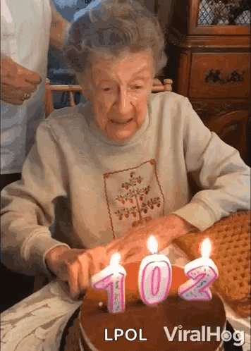 Elderly Woman with Heart Glasses and Cane
