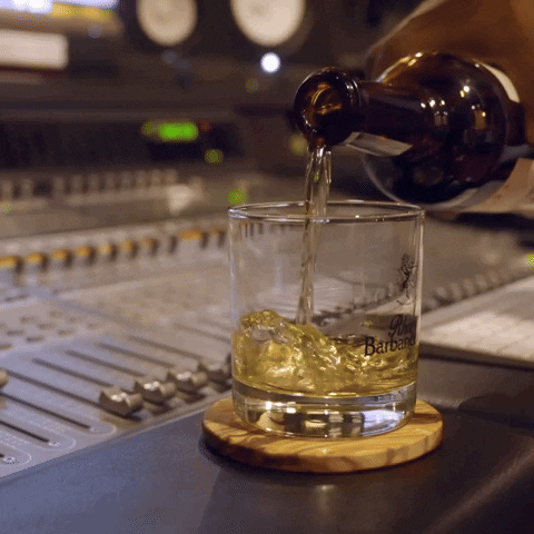 Elegant Man Drinking Rum GIF