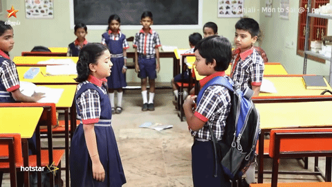 Elementary Boy Gives Girl Water To Drink GIF