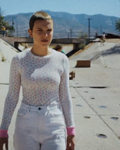 Eleven Millie Bobby Brown Walking On Street GIF