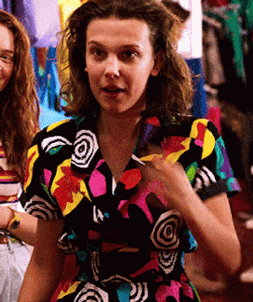Eleven Fixing Hair Looking Gorgeous GIF
