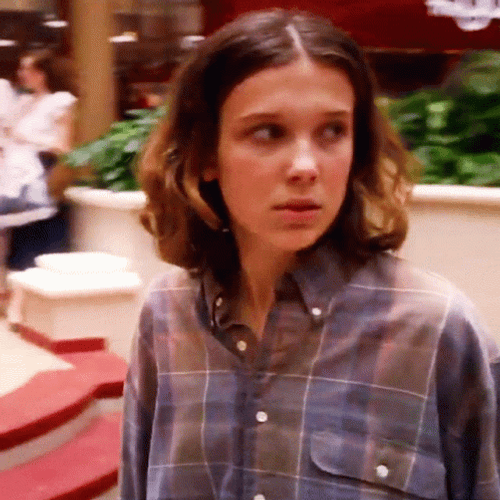 Eleven Smiling Looking Around Stranger Things GIF