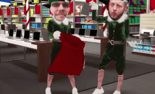 Elf Dancing Putting Gifts GIF