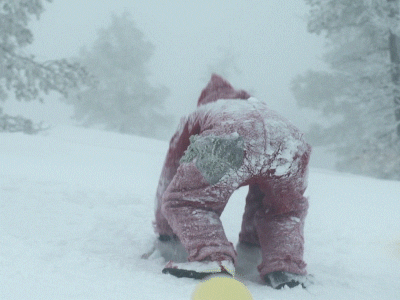 Elf Santa Playing Snow GIF