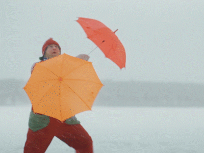 Elf Santa Playing The Umbrella GIF